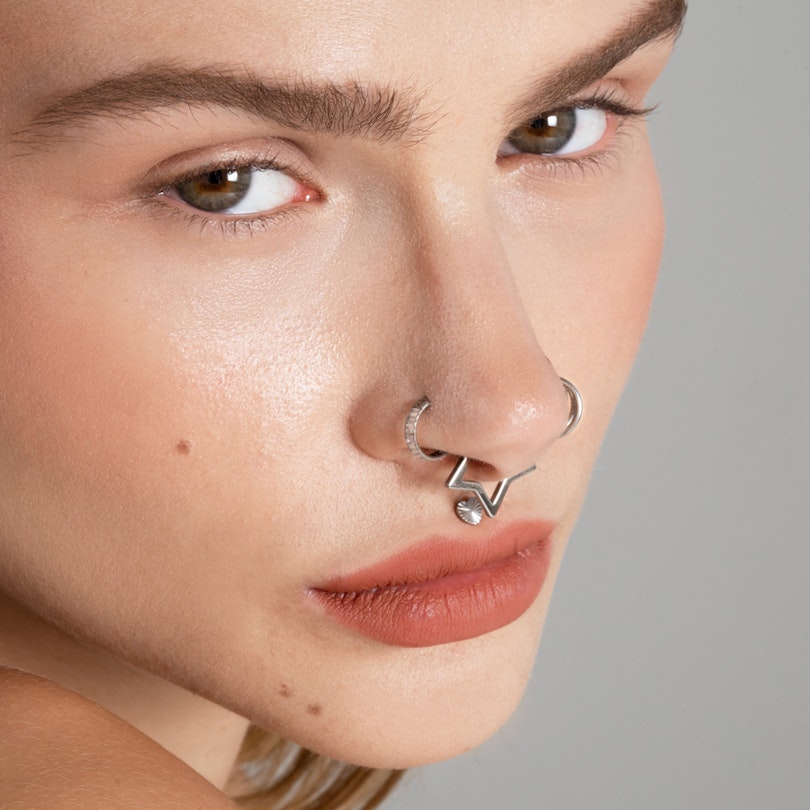 Titanium ring with narrow baguette cut stones Body Piercing