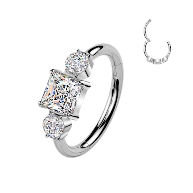 Titanium hinged ring with three CZ stones