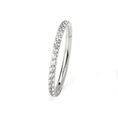 Hinged ring made of titanium with outward facing stones