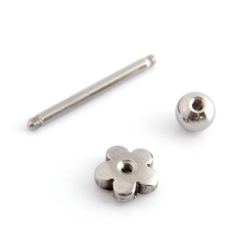 Tongue barbell with little flower Body Jewelry
