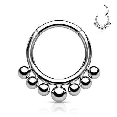 Ring made of titanium with a hinge and small beads