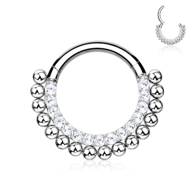 Hinged ring made of titanium with gemstones and small beads