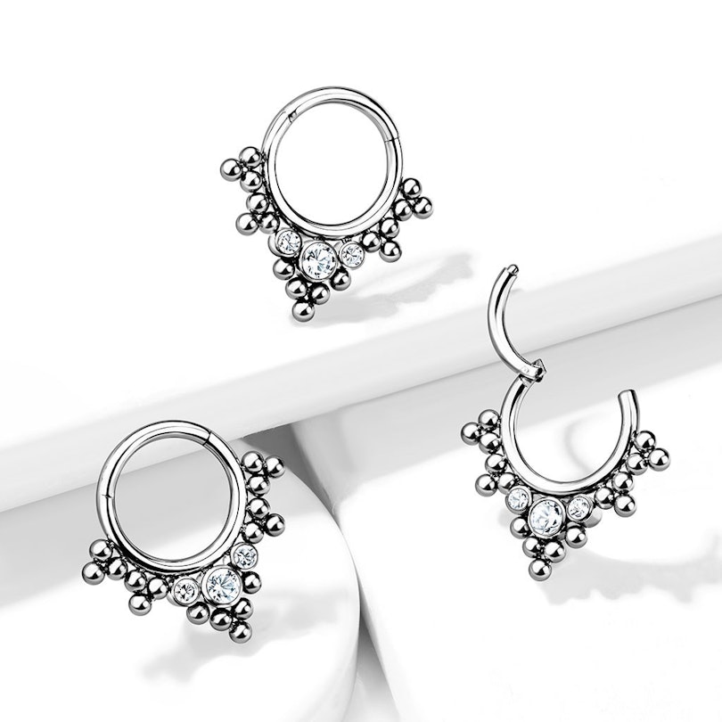 Hinged ring made of titanium with clustered beads and stones Body Piercing