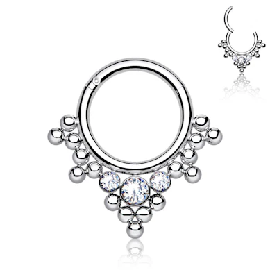 Hinged ring made of titanium with clustered beads and stones