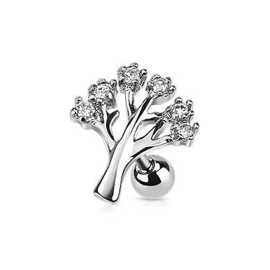 Tragus piercing with studded tree charm