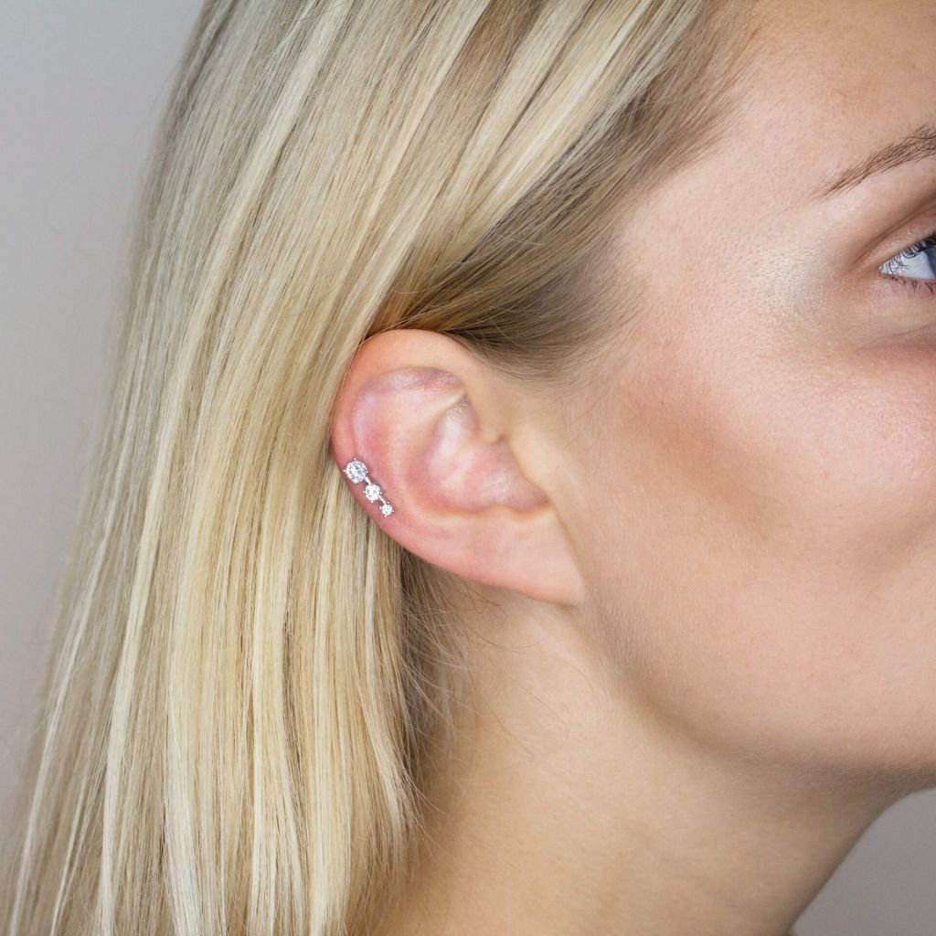 Three earring piercing hot sale