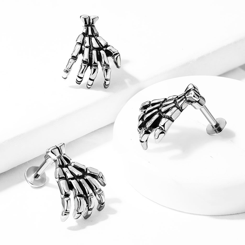 Skeleton hand on a labret Use it in the ear or lip piercing