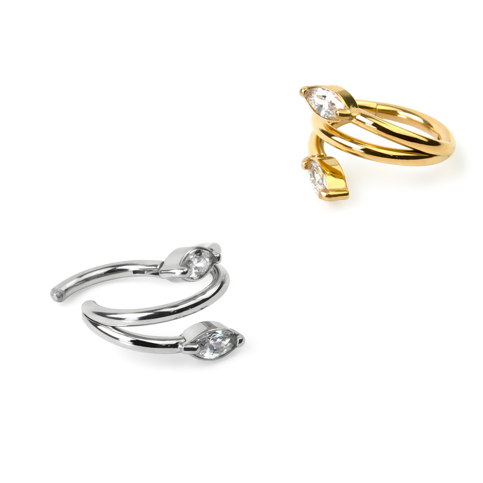 Double effect segment ring with marquise cut stones