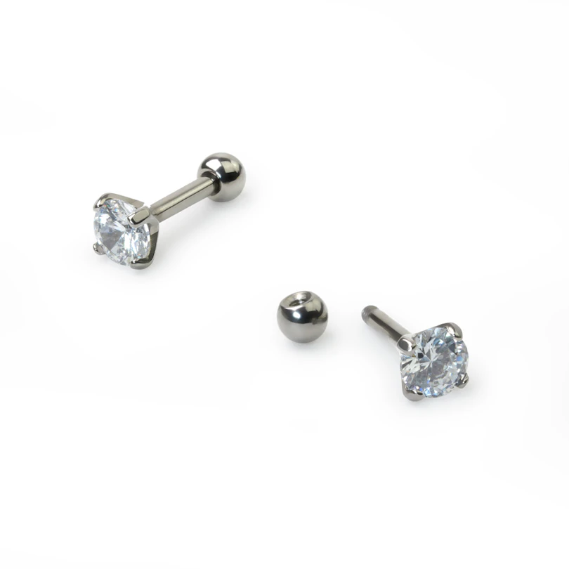 Barbell made of titanium with round stone