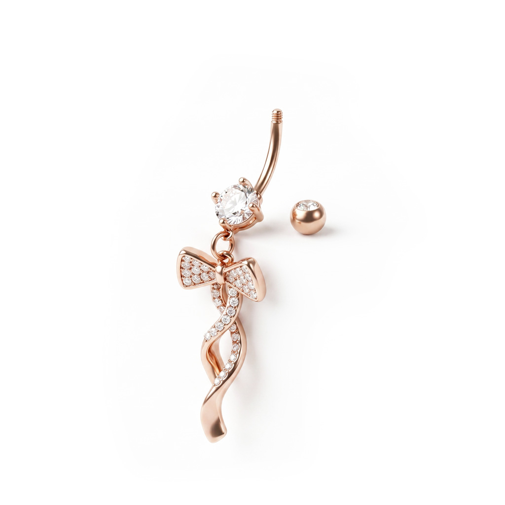 Belly button ring rose gold-plated with studded bow dangle