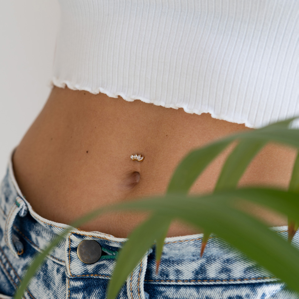 Titanium belly button piercing with stones in a marquise design