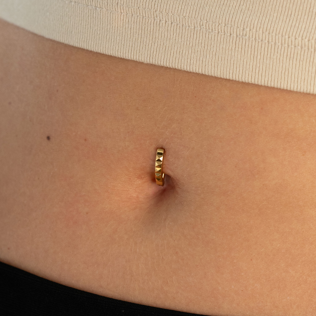 Faceted titanium belly clicker