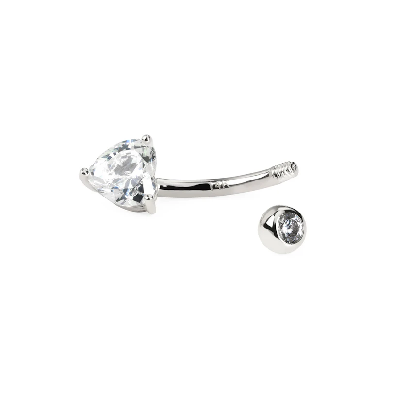 Belly button ring made of 14k gold with heart shaped bottom stone