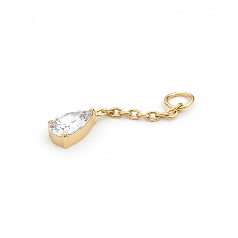 Charm with teardrop stone