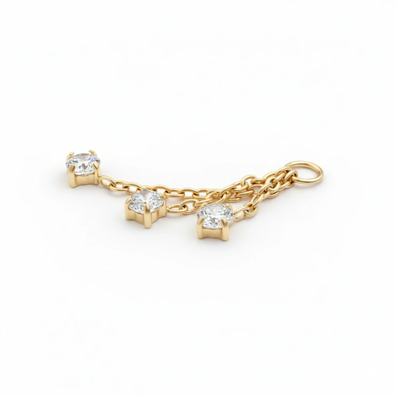 Charm with trio of stones