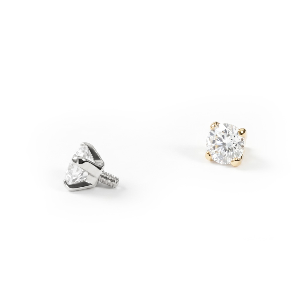 Dermal top made of solid 14k gold with clear gem