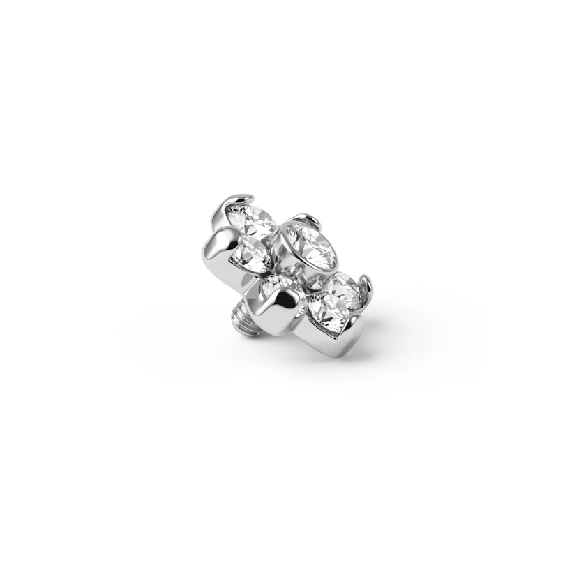 Dermal top jewelry with stones forming a flower