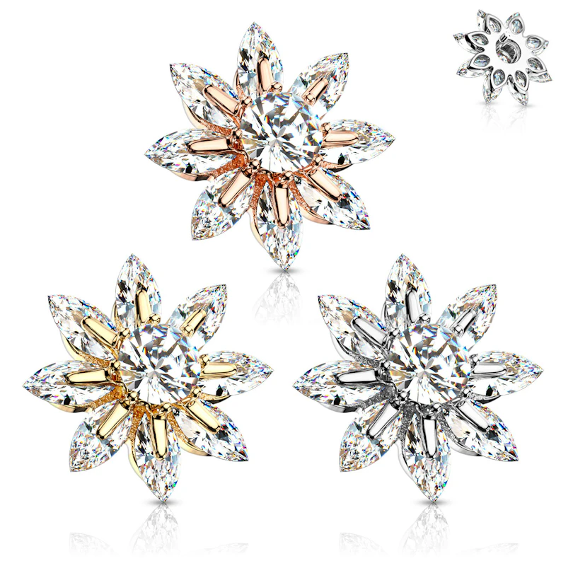 Dermal top with flower of studded petals and large central gem