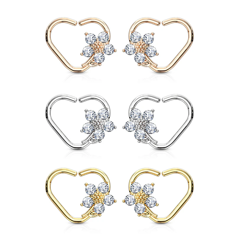 Ear piercing with heart shape and flower charm