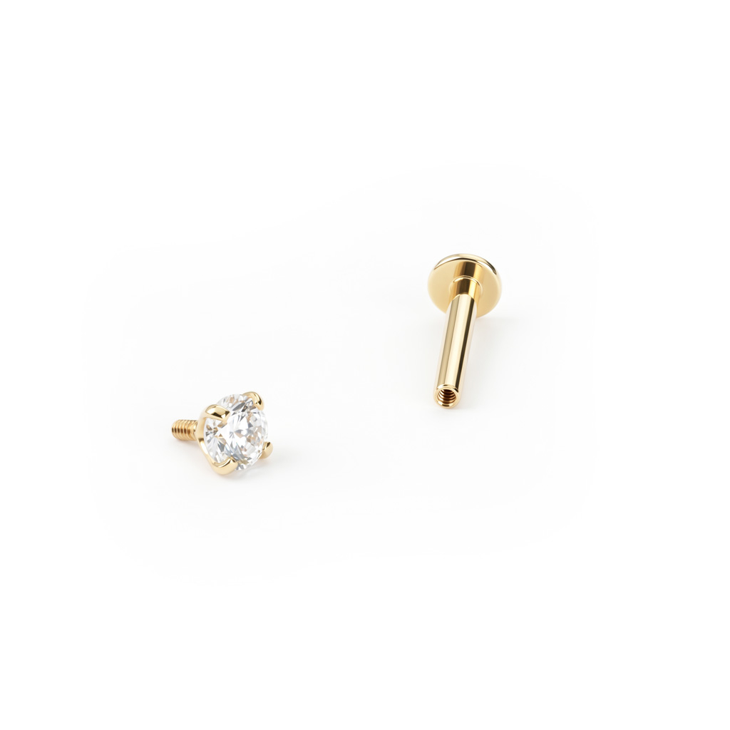 Labret made of 14k gold with internal thread and gem