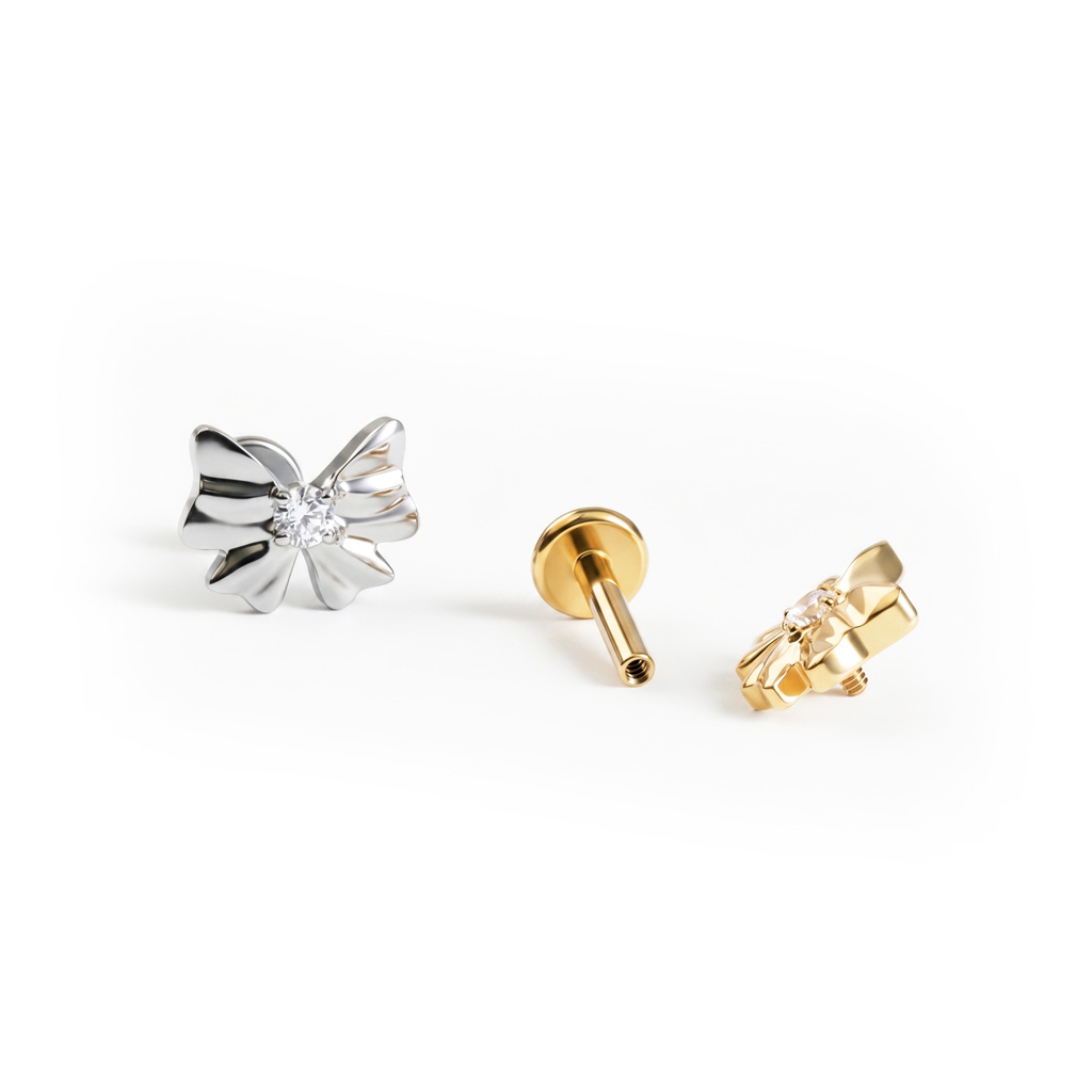 Bow labret in titanium with central stone