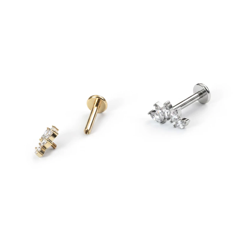 Curved titanium labret with 5 stones