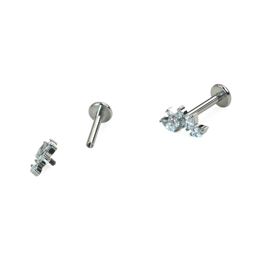 Curved titanium labret with 5 stones