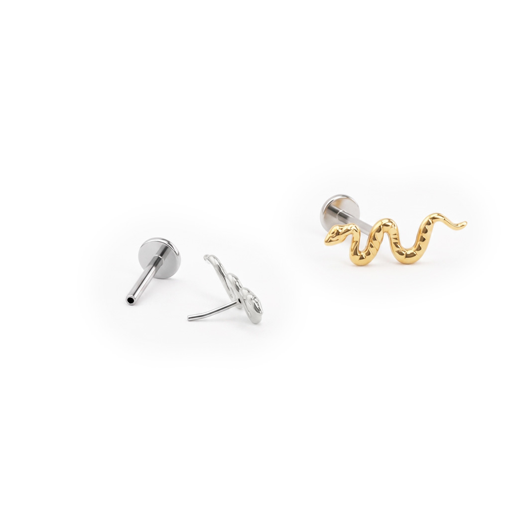 Push-in titanium labret with a snake