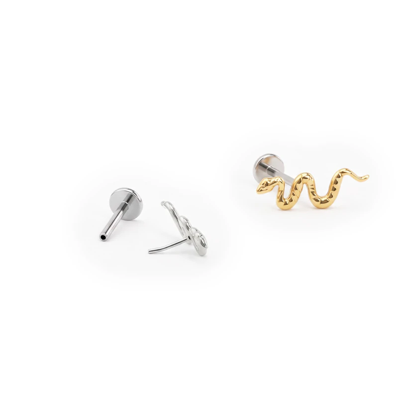 Push-in titanium labret with a snake