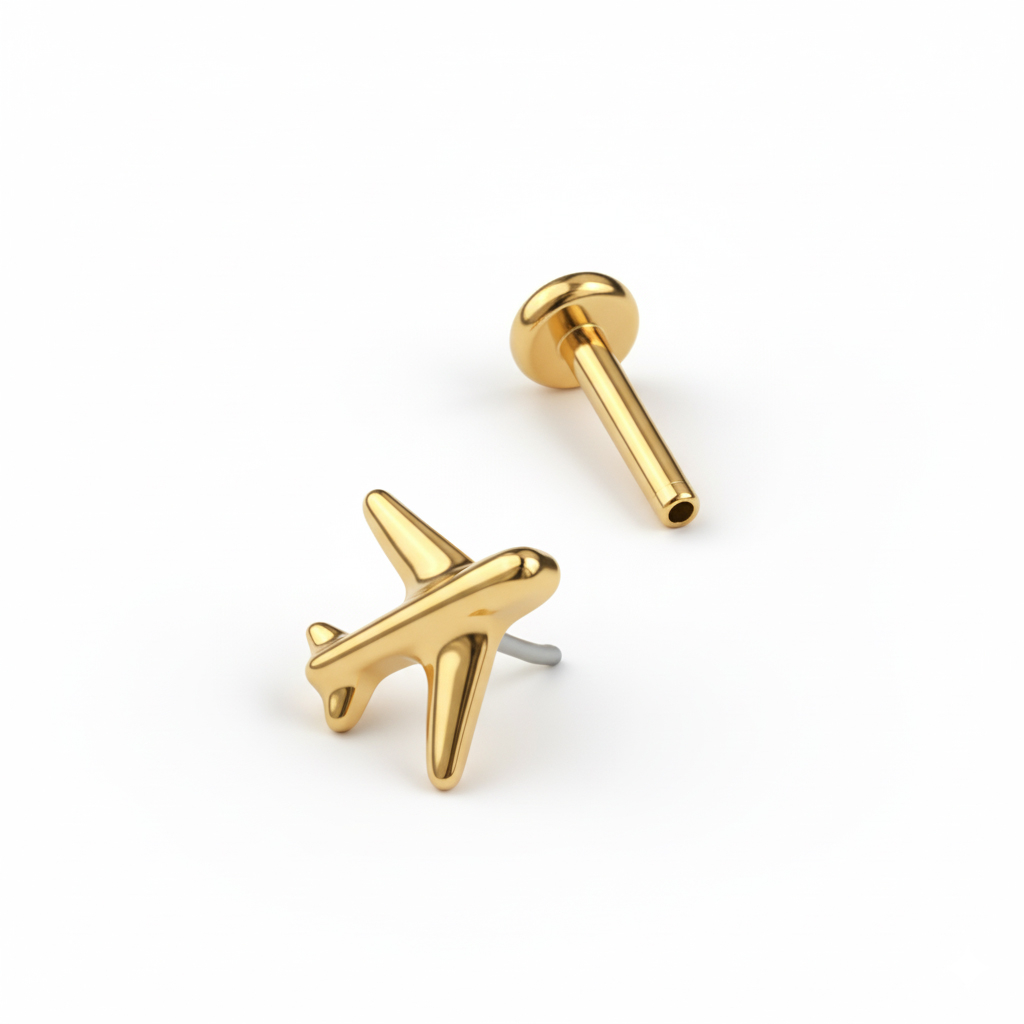 Labret iz titana z motivom letala