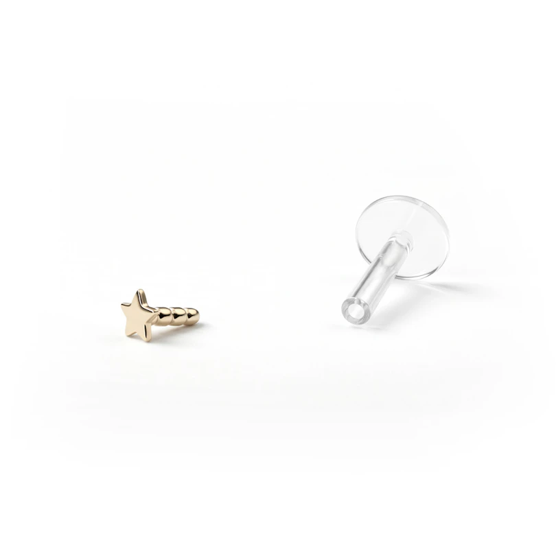 Labret with top star made of 14k gold