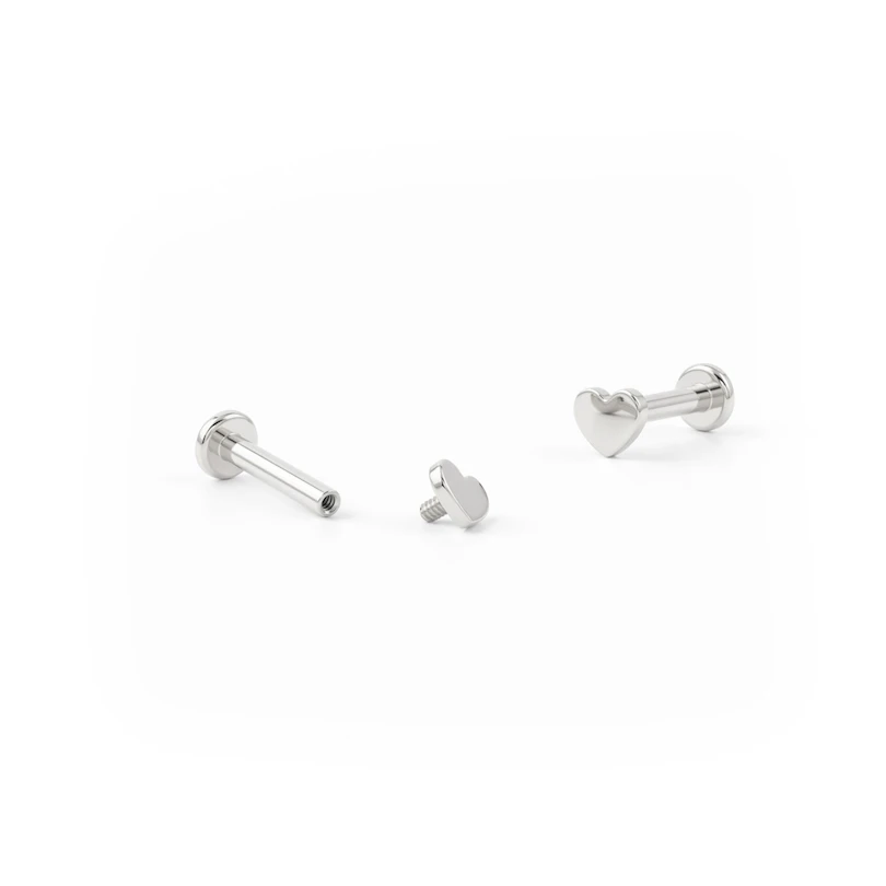 Labret made of titanium with internally threaded top in different designs