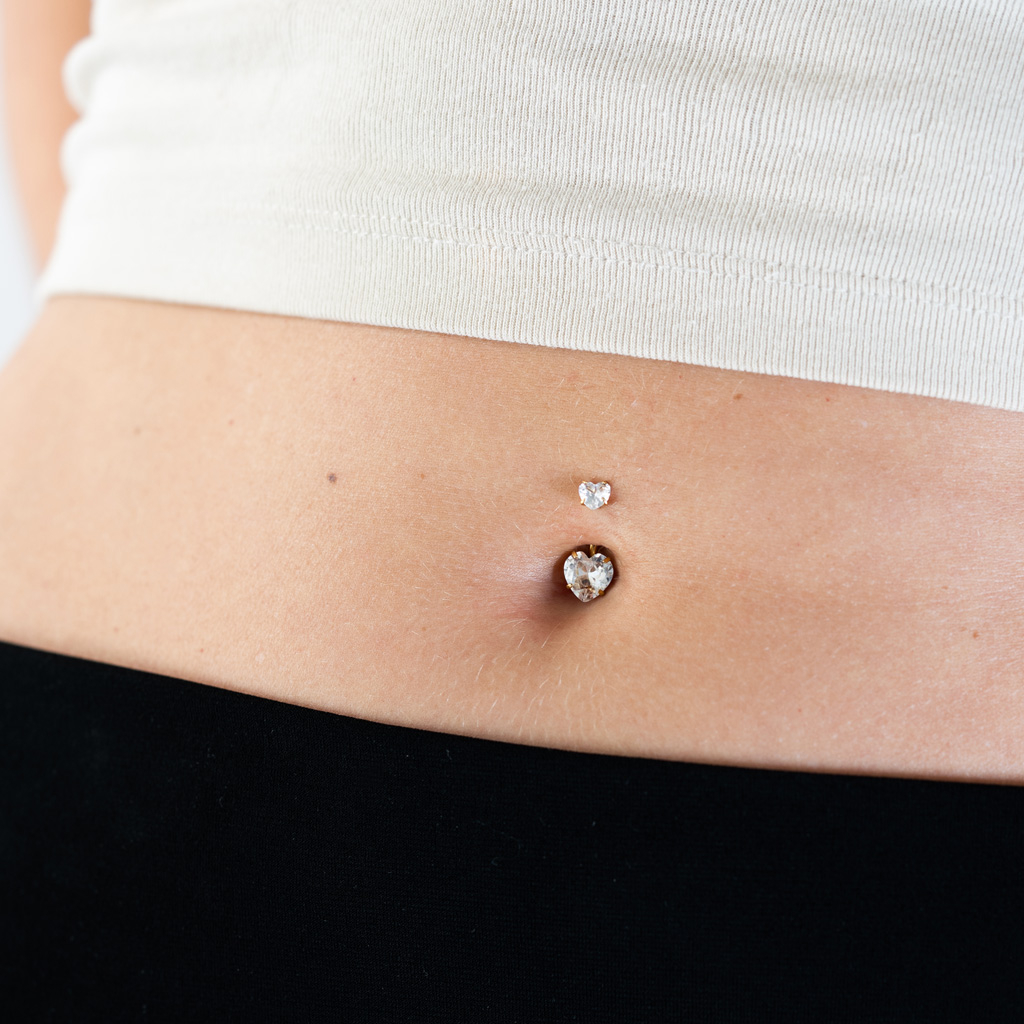 Belly button ring internally threaded with hearts