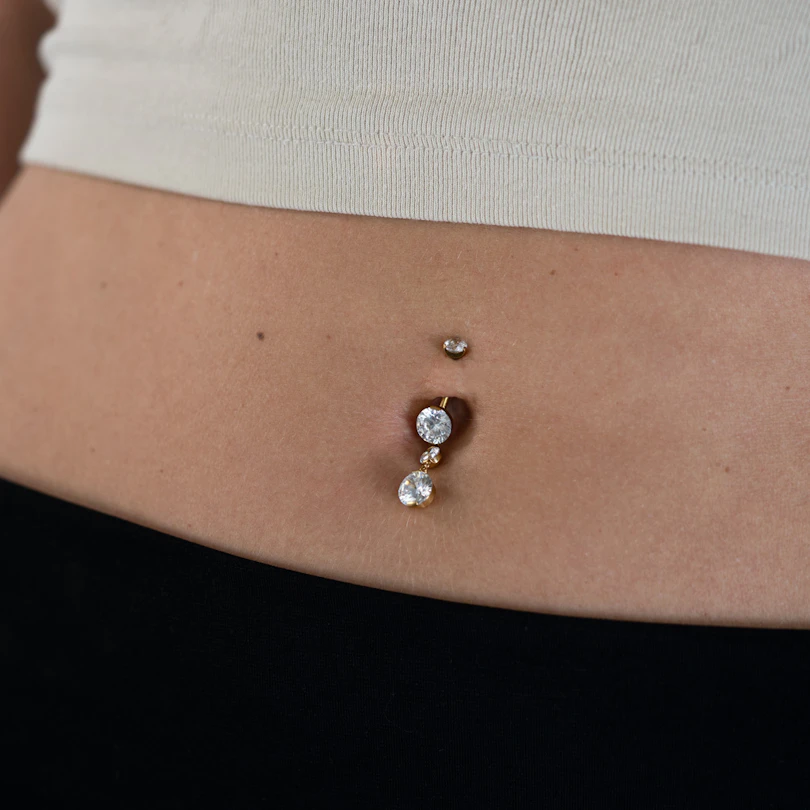 Titanium belly ring with dangle