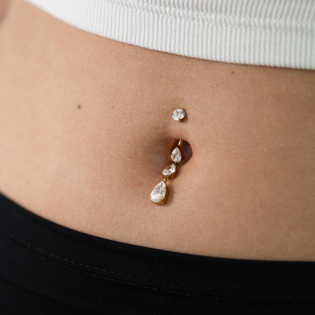 Titanium belly ring with cascading stones
