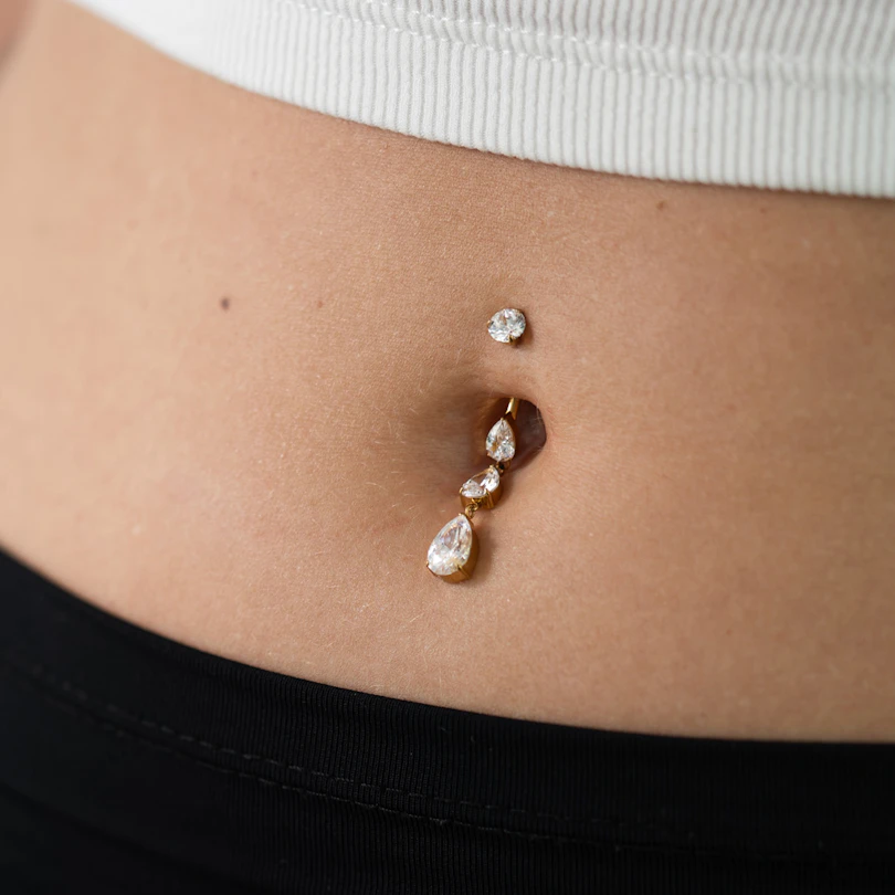 Titanium belly ring with cascading stones