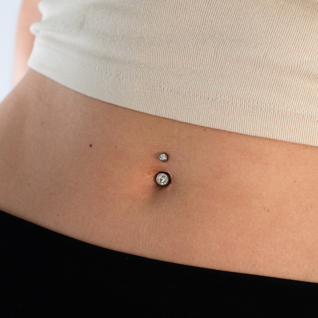 Belly button ring double jeweled made of surgical steel in a variety of colors