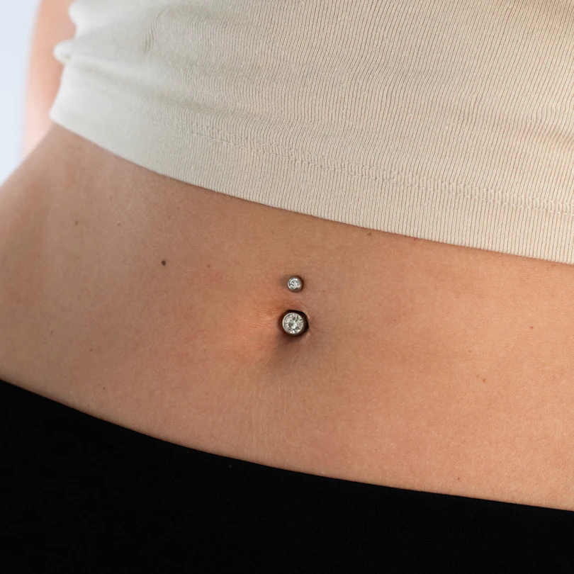 Belly button ring double jeweled made of surgical steel in a variety of colors