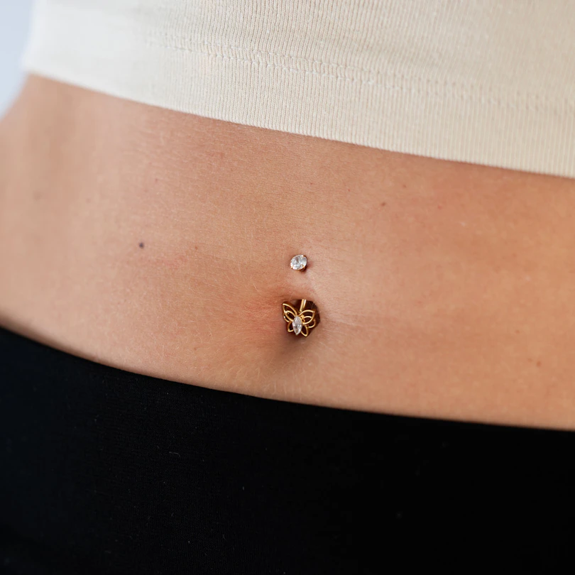 Stylized butterfly titanium belly ring