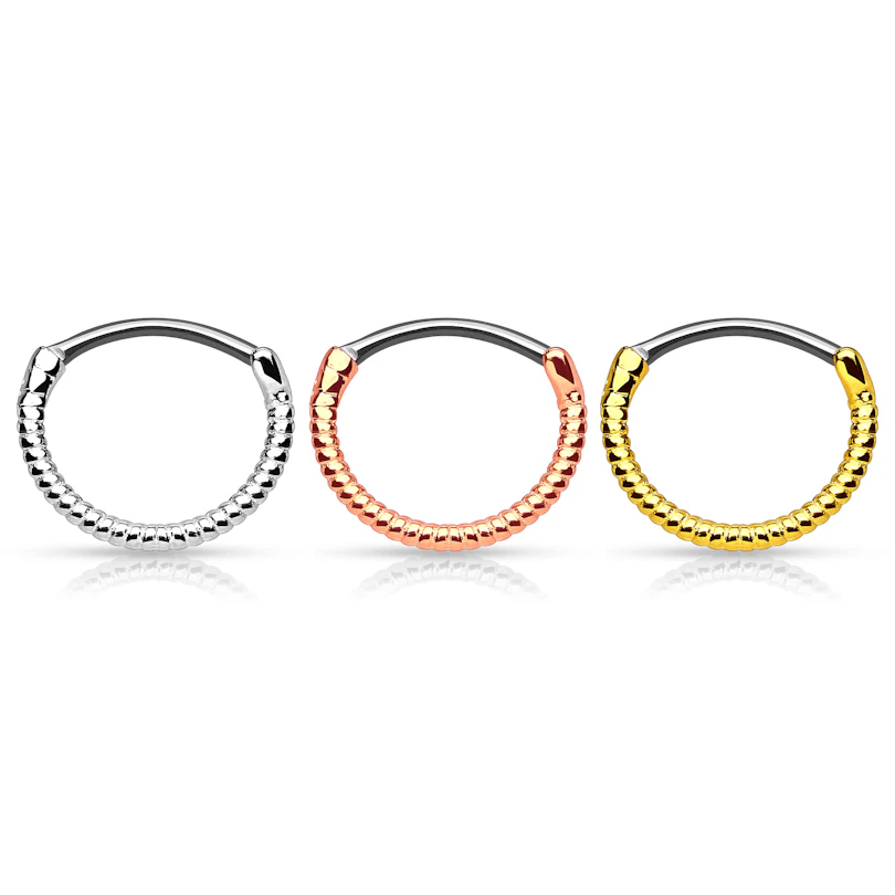 Septum clicker with twisted wire