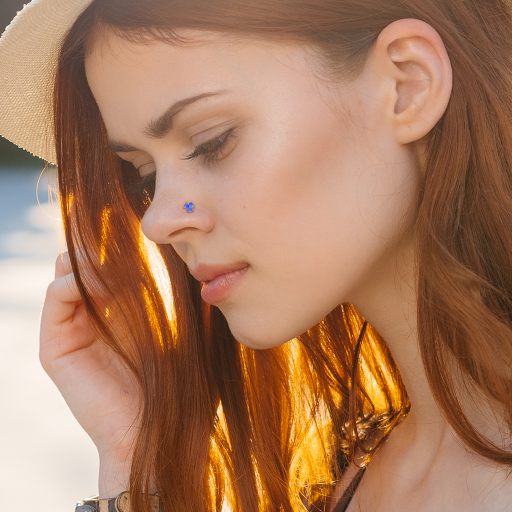 Nose ring L-shaped made of 14k gold with three opals