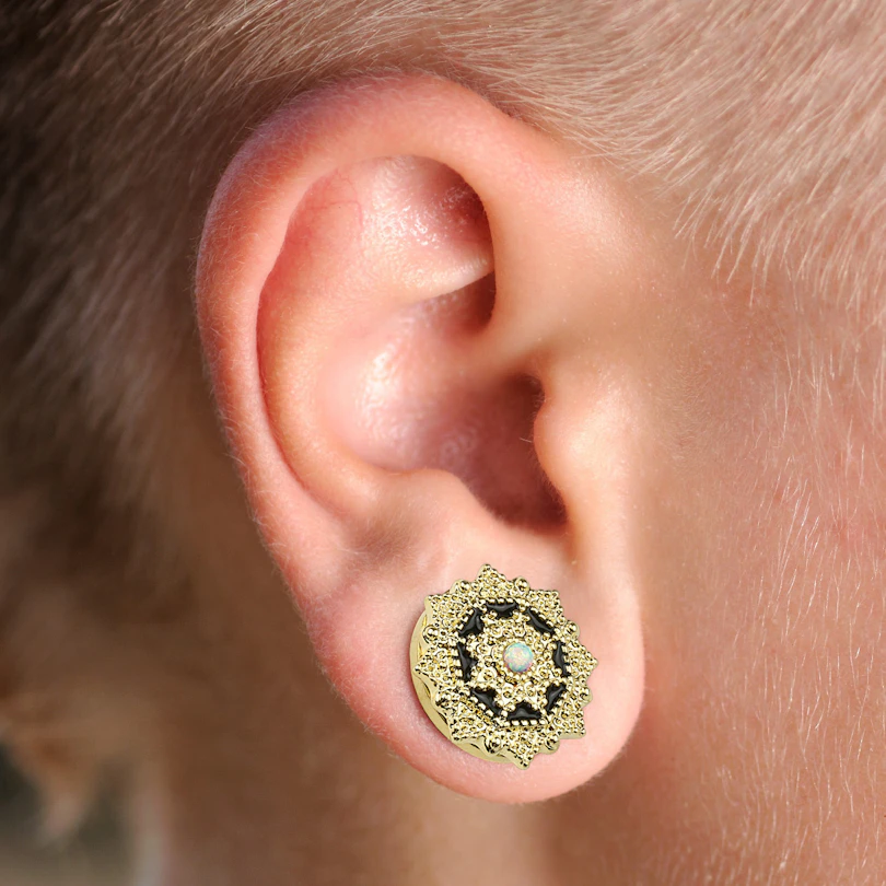 Plug with detailed front and opal stone