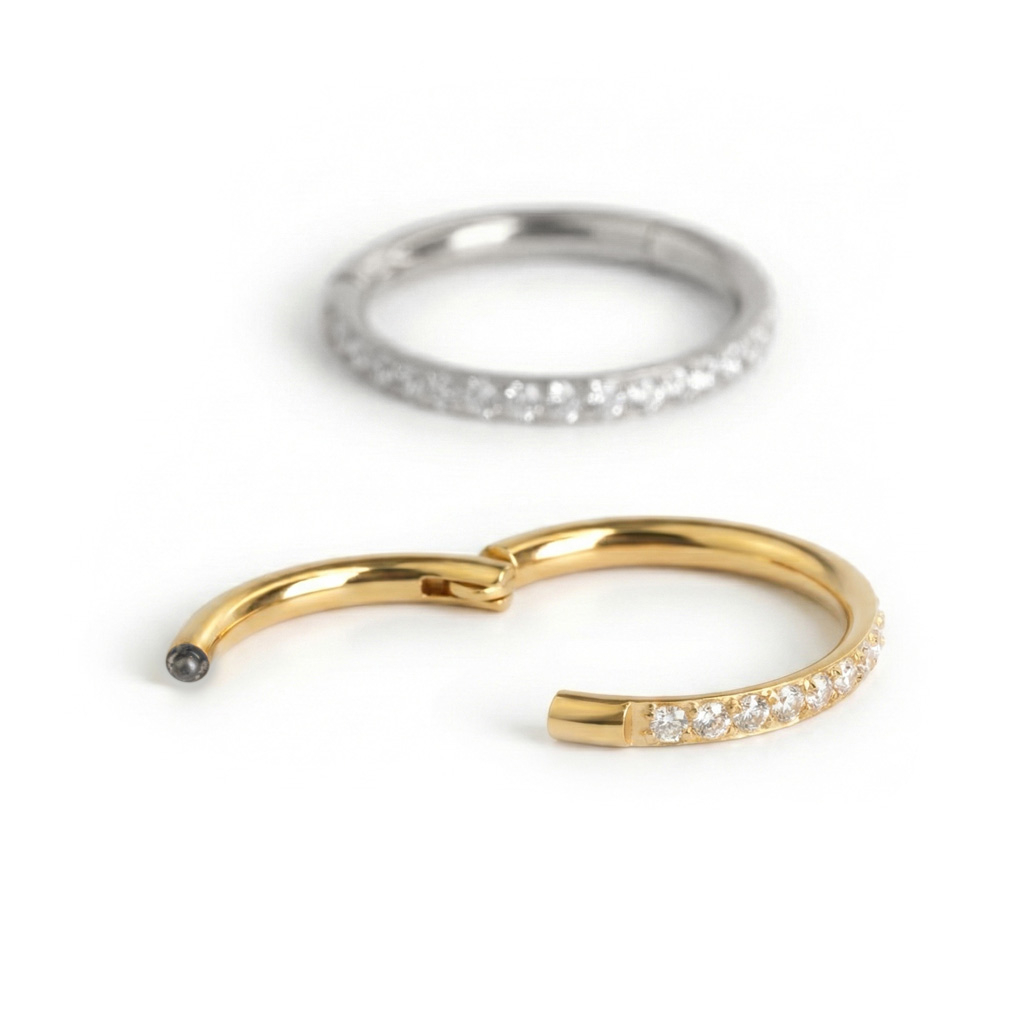 Hinged ring made of surgical steel with outward facing stones