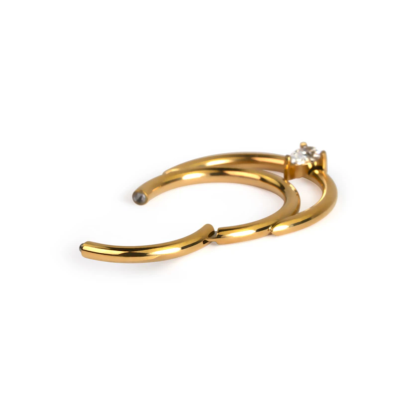 Titanium hinged ring with double hoop and teardrop stone
