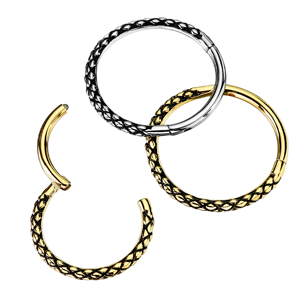 Hinged segment ring with snakeskin design
