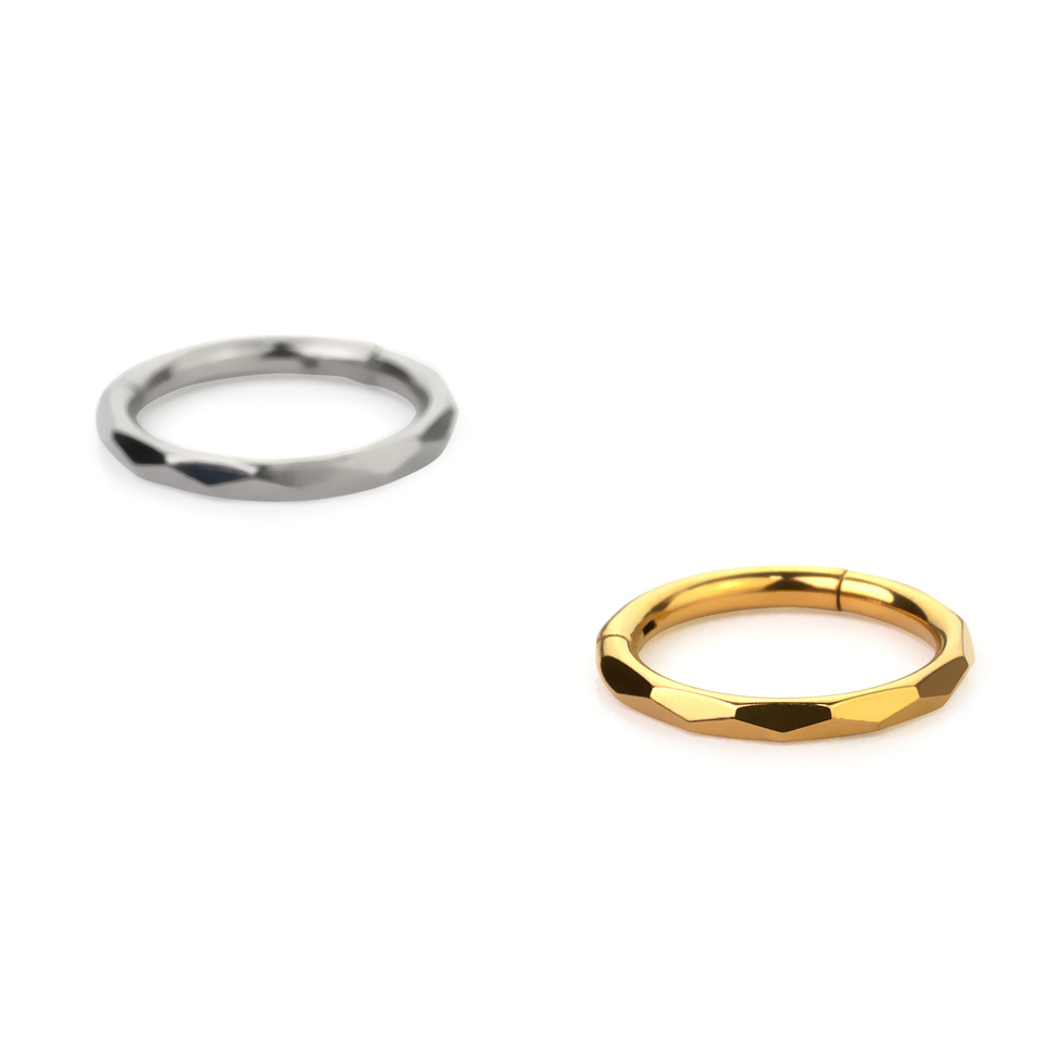 Titanium hinged ring with diamond pattern