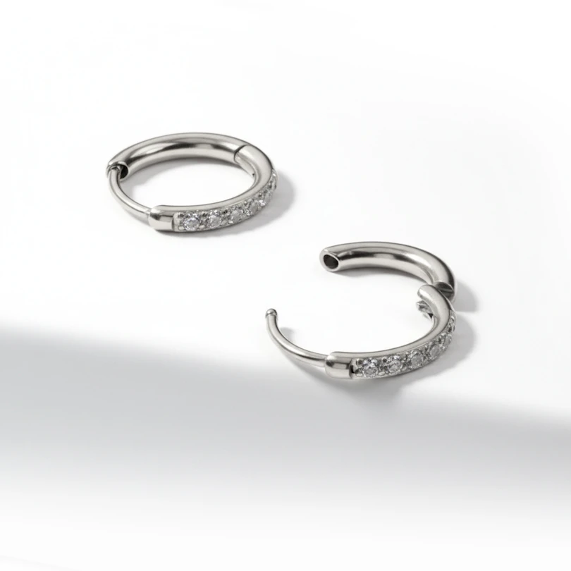 Pair of surgical steel huggie hoops with gemstones