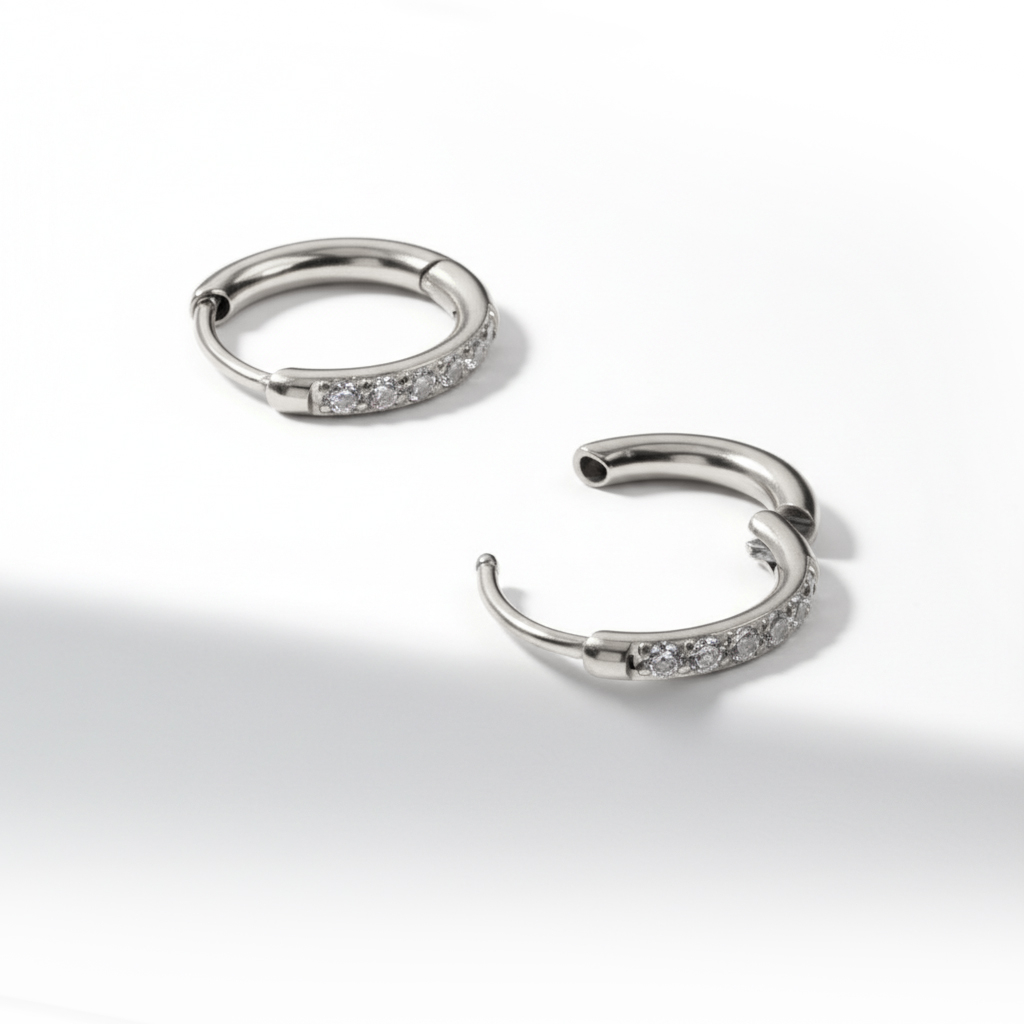 Pair of surgical steel huggie hoops with gemstones