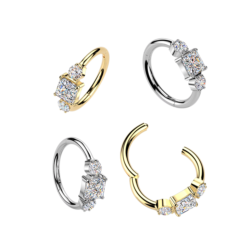 Titanium hinged ring with three CZ stones