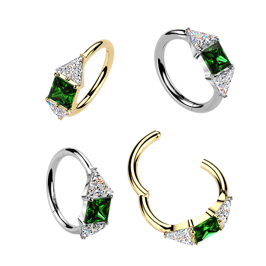 Titanium ring with central green stone